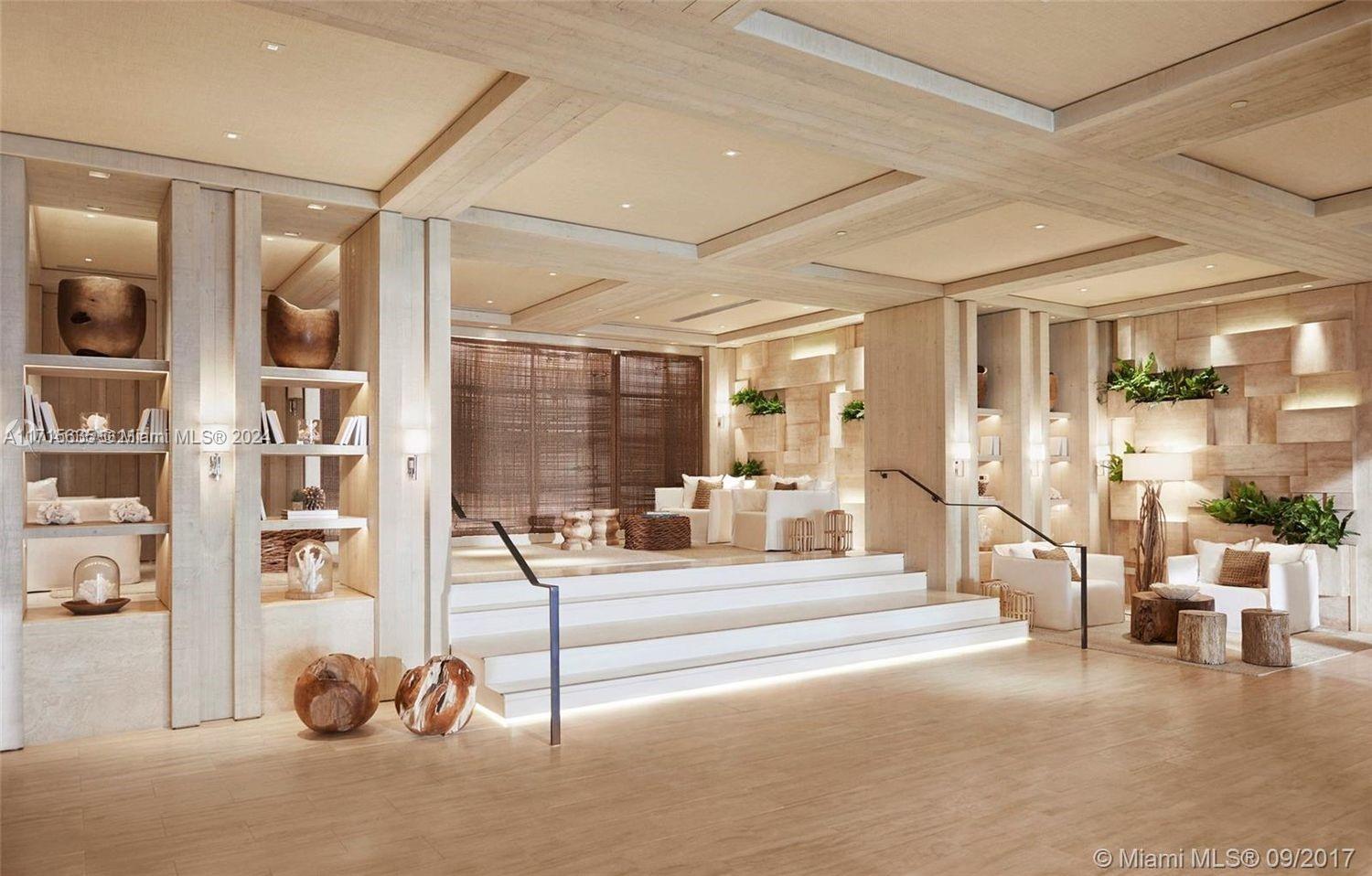 102 24th Street, Unit PH1617 Miami Beach, FL 33139 - Photo 14 of 28 a living room with lots of furniture and a chandelier