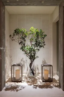 a vase of flowers sitting on a table