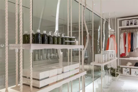 a view of a balcony with furniture