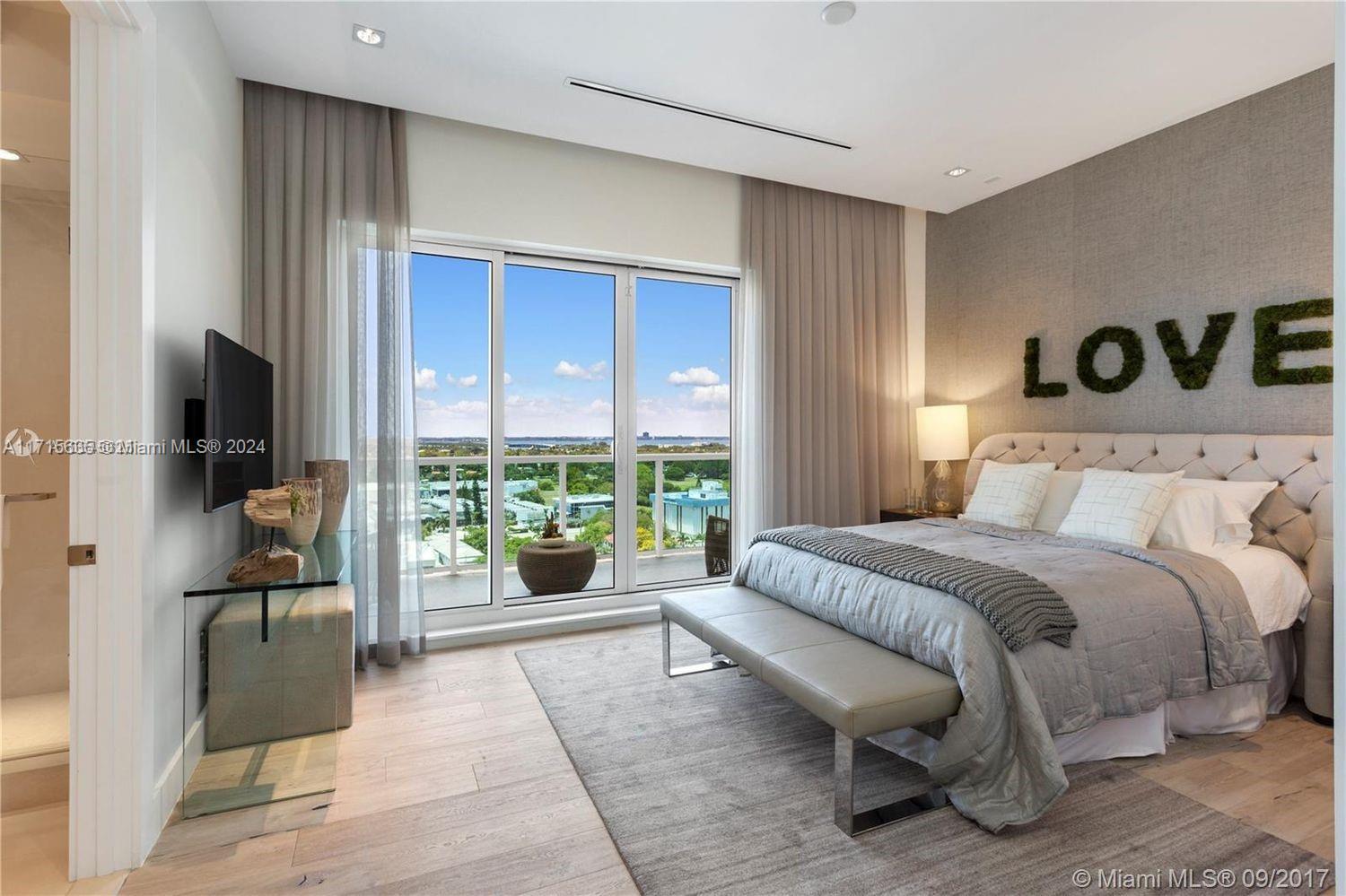 102 24th Street, Unit PH1617 Miami Beach, FL 33139 - Photo 6 of 28 a spacious bedroom with a bed and glass window