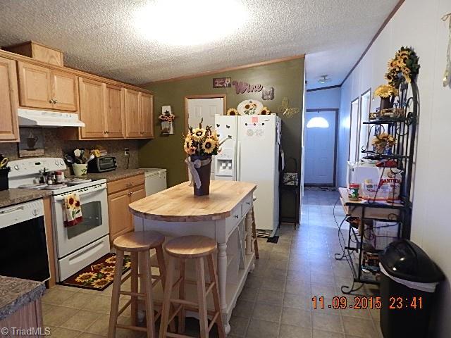 1036 Barn Road Walnut Cove, NC 27052 - Photo 7 of 24 Another view of kitchen.