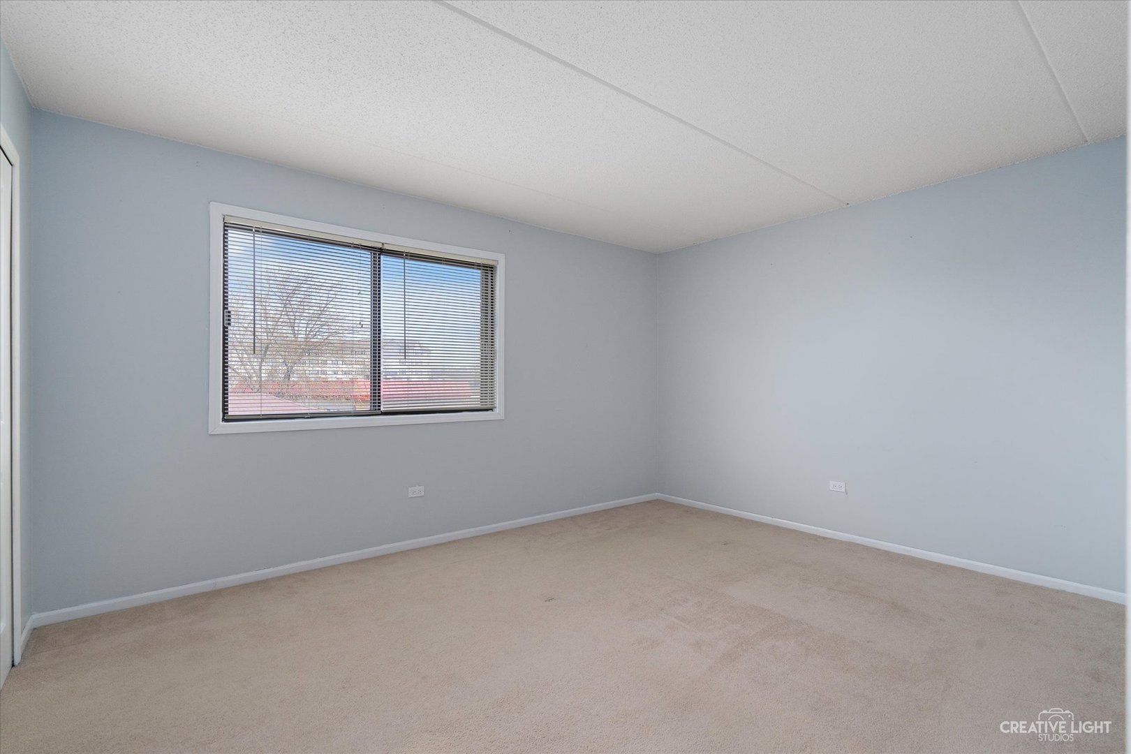 1239 Chalet Road, Unit 200 Naperville, IL 60563 - Photo 11 of 16 a view of an empty room with a window