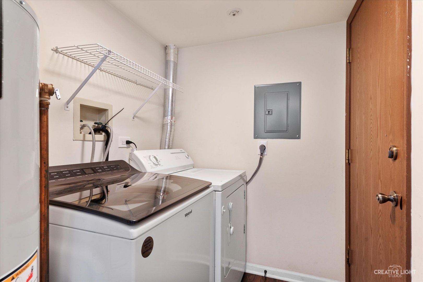 1239 Chalet Road, Unit 200 Naperville, IL 60563 - Photo 14 of 16 a bathroom with a sink and mirror