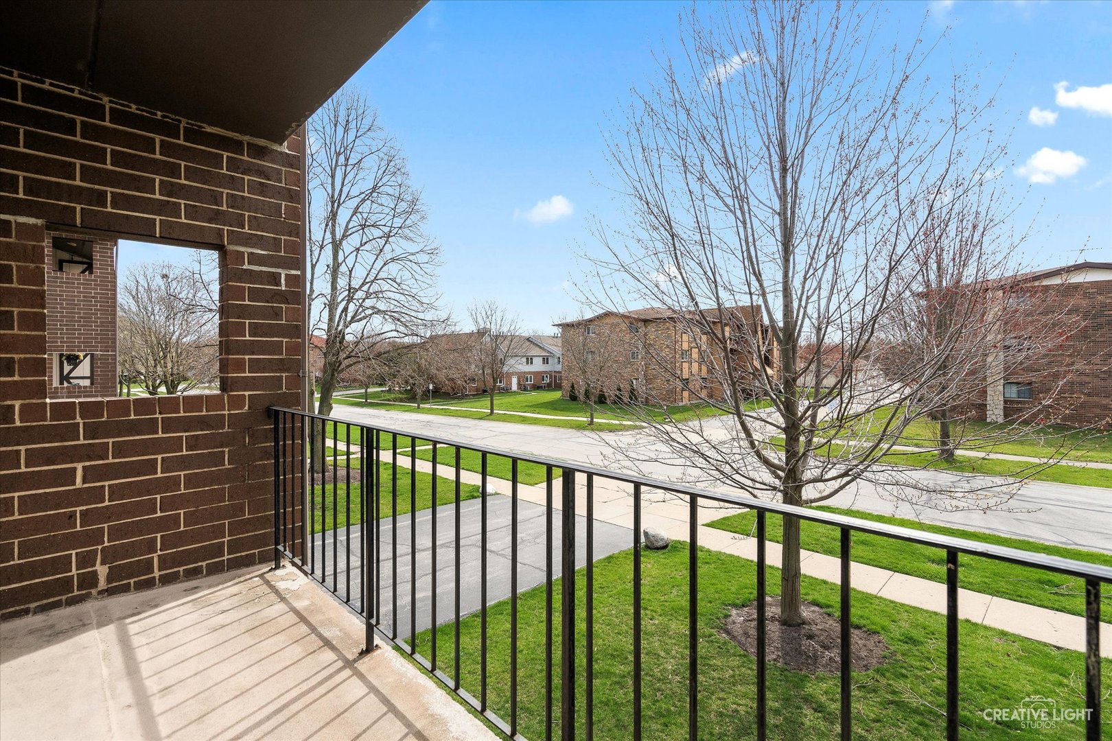 1239 Chalet Road, Unit 200 Naperville, IL 60563 - Photo 15 of 16 a view of a balcony with a pot
