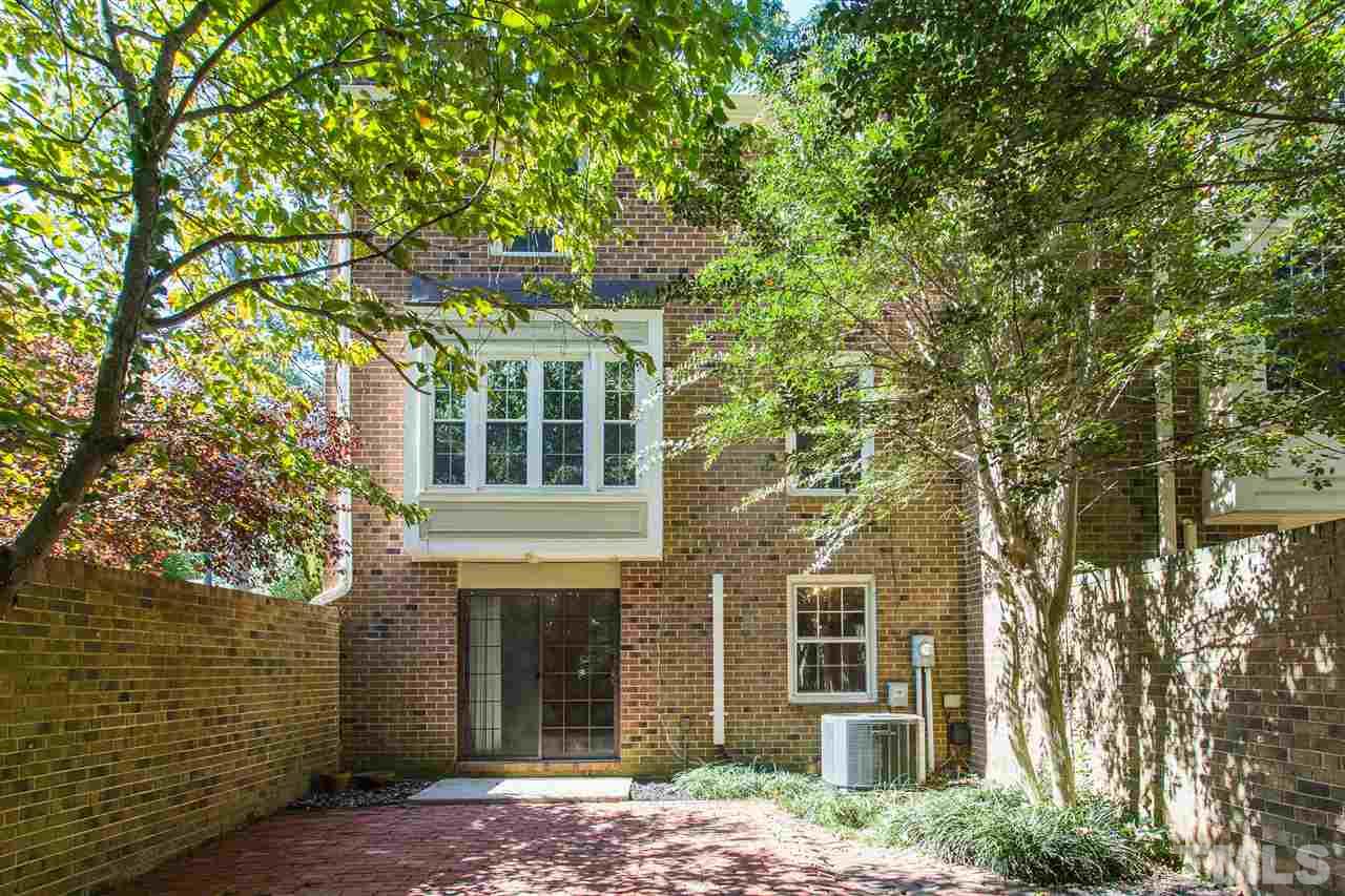 2856 Wycliff Road Raleigh, NC 27607 - Photo 3 of 29 a front view of a house with a garden