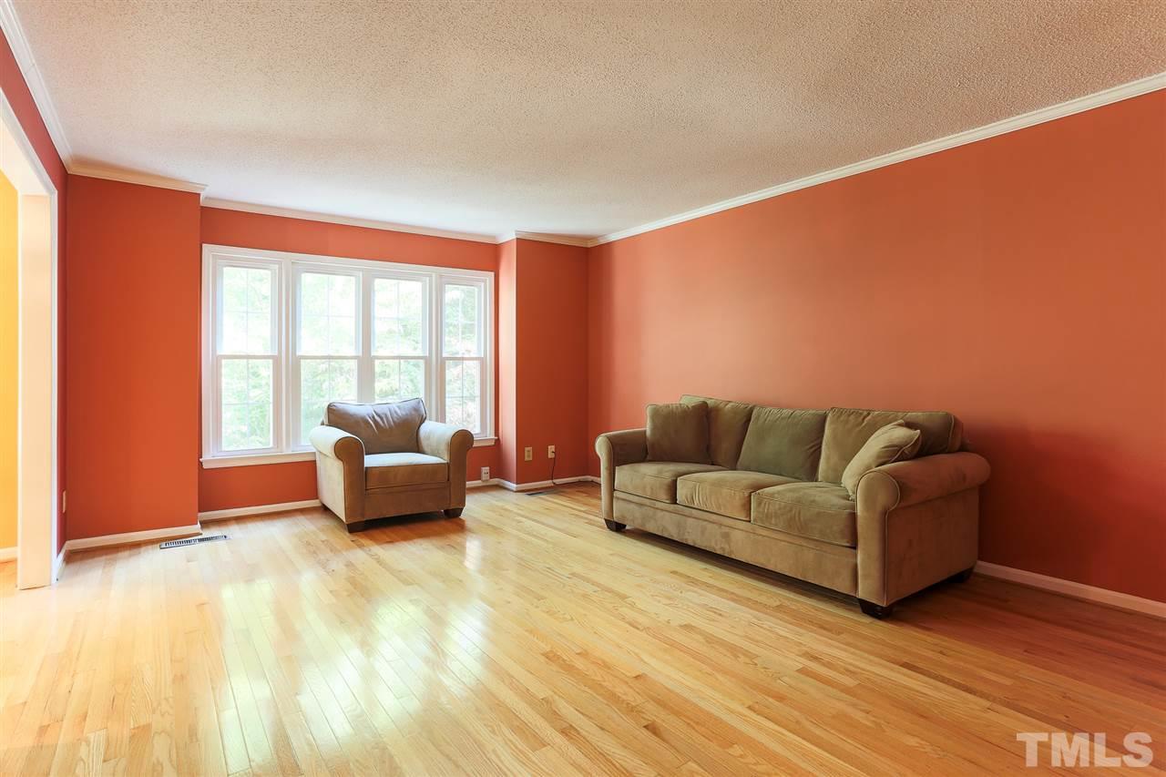2856 Wycliff Road Raleigh, NC 27607 - Photo 7 of 29 a living room with furniture and a large window