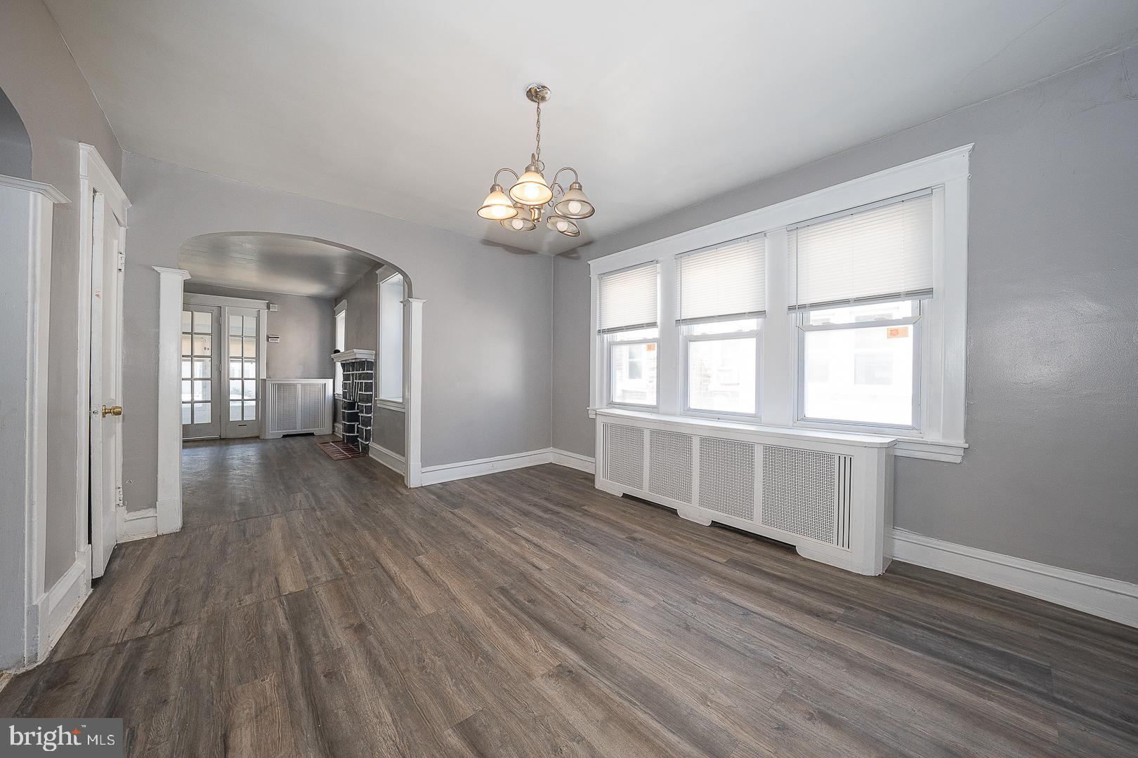 169 Overhill Road Upper Darby, PA 19082 - Photo 18 of 69 wooden floor in an empty room with a window