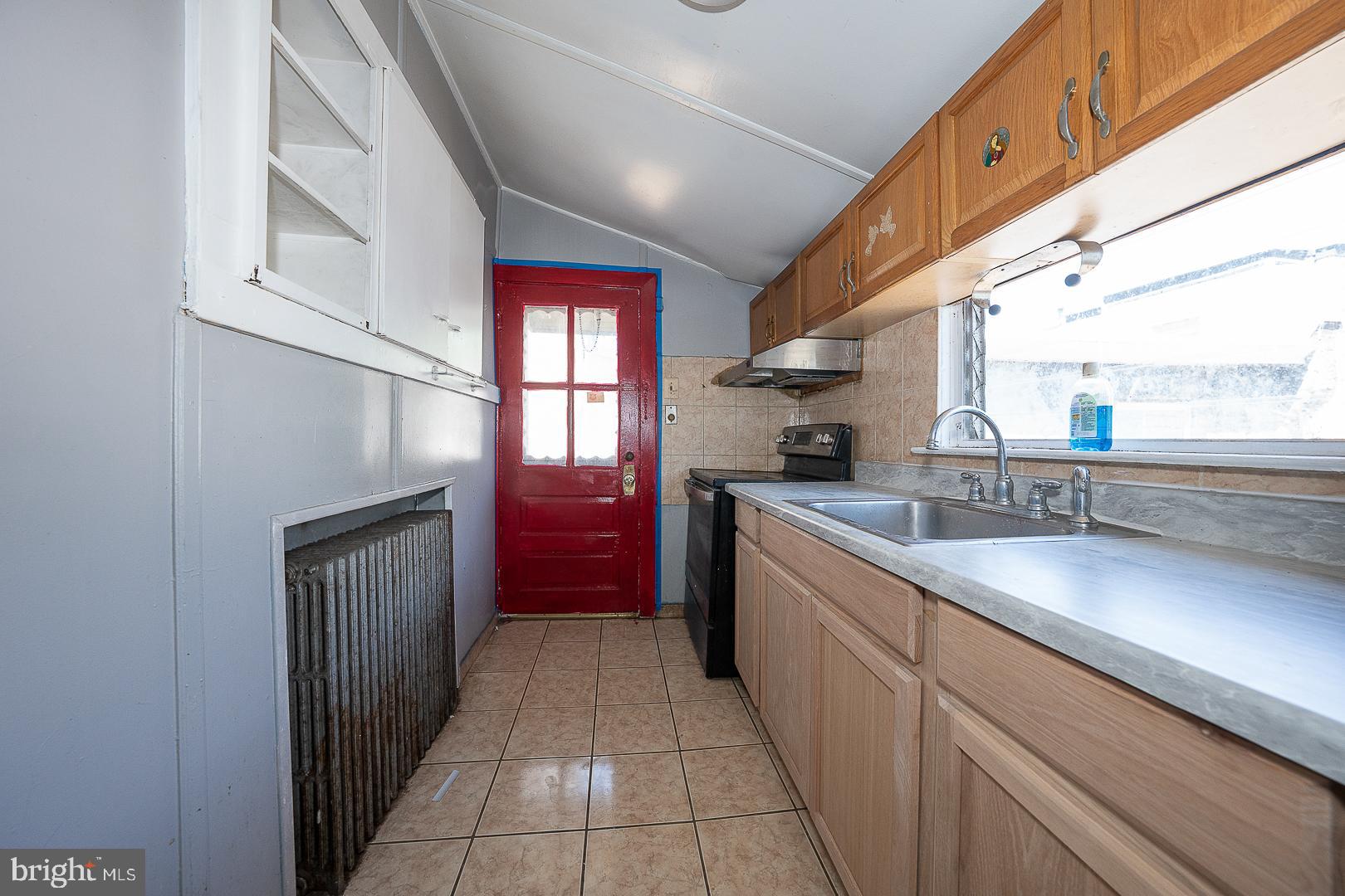 169 Overhill Road Upper Darby, PA 19082 - Photo 27 of 69 a kitchen with sink cabinets and window