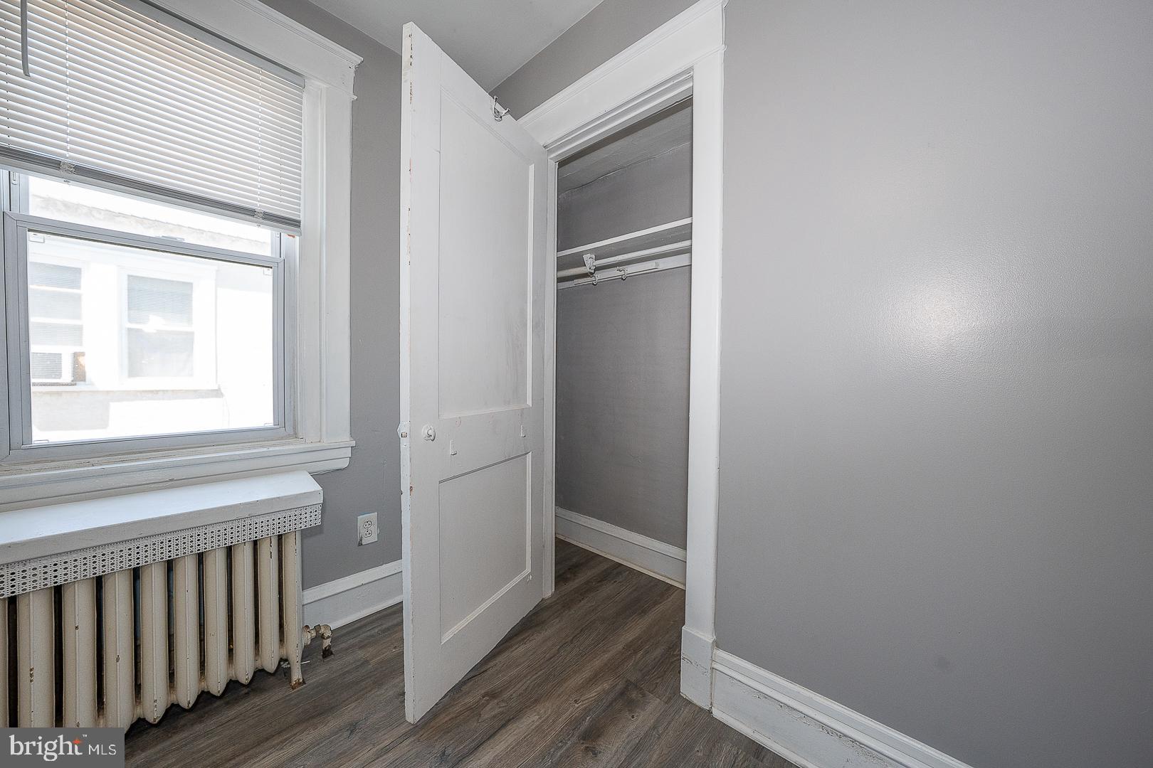 169 Overhill Road Upper Darby, PA 19082 - Photo 41 of 69 a view of a hallway with wooden floor and staircase