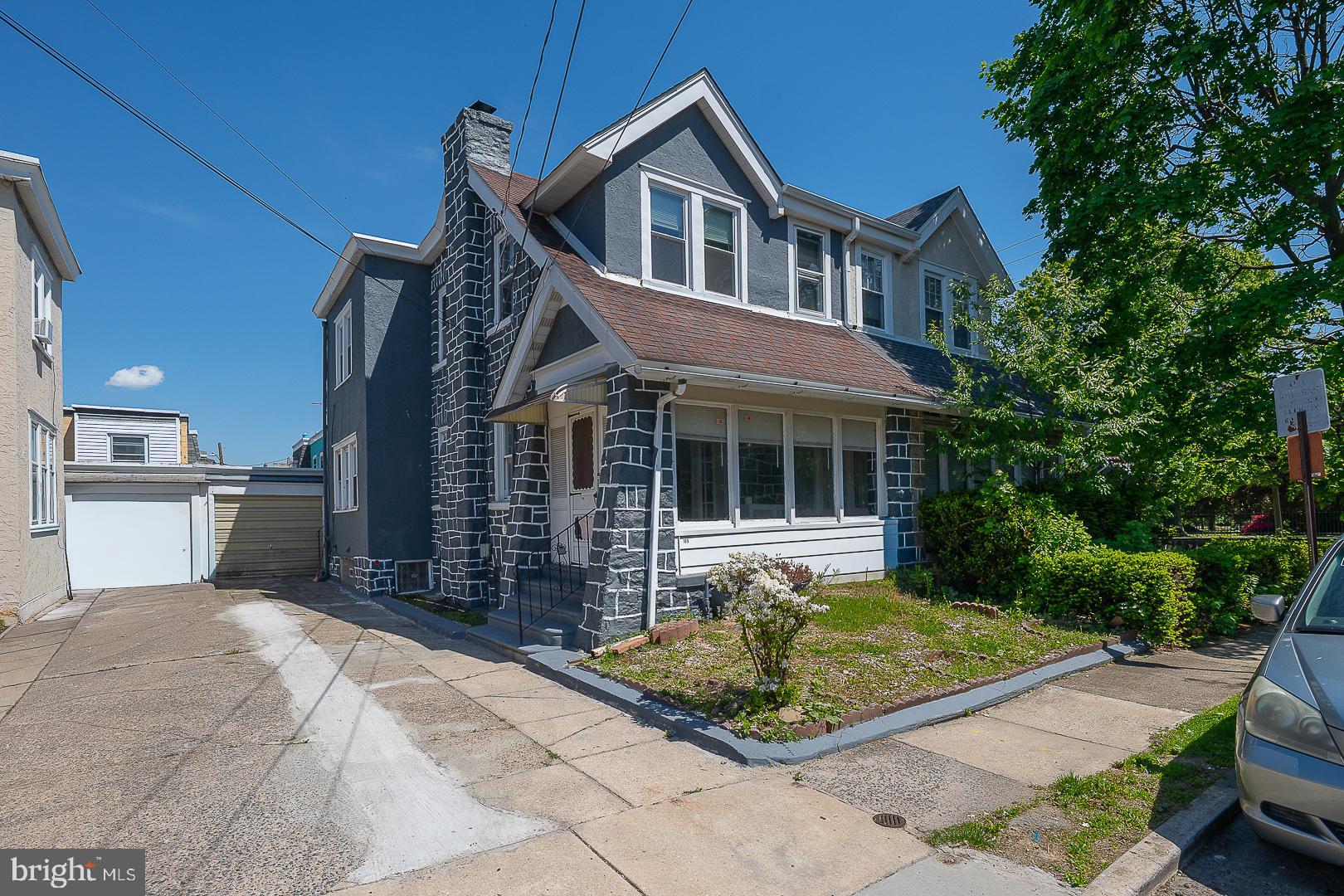 169 Overhill Road Upper Darby, PA 19082 - Photo 10 of 69 a front view of a house with a yard