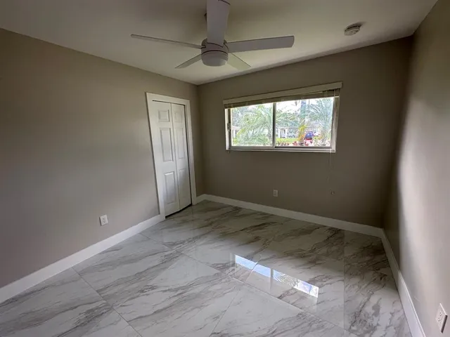 a view of livingroom with furniture and a window