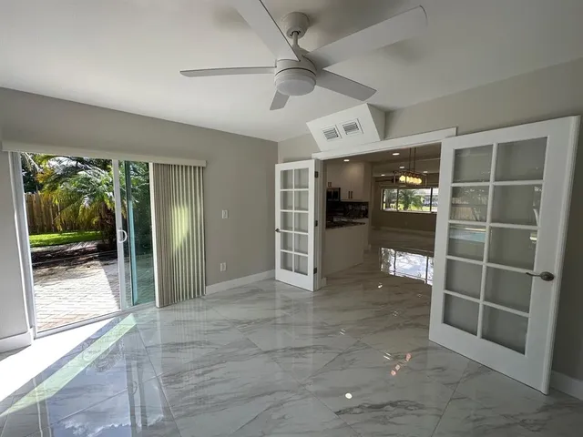 a kitchen with a stove and a refrigerator