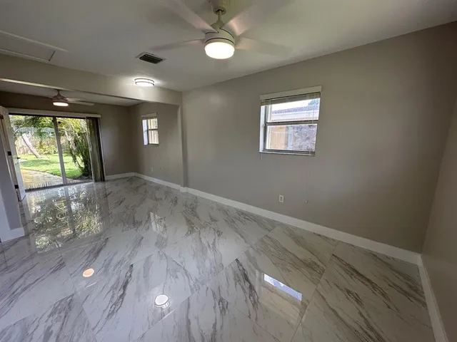 a bathroom with double vanity and a sink