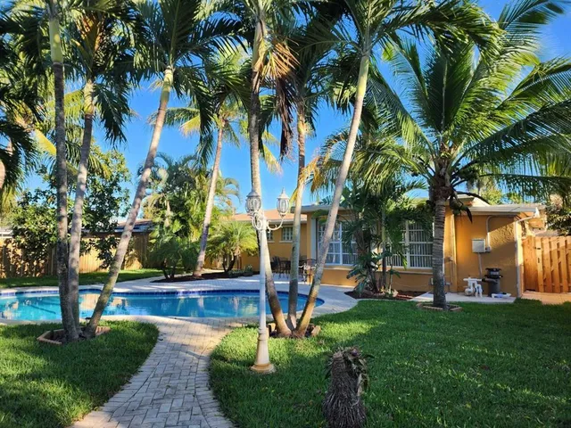 a kitchen with counter top space cabinets and stainless steel appliances