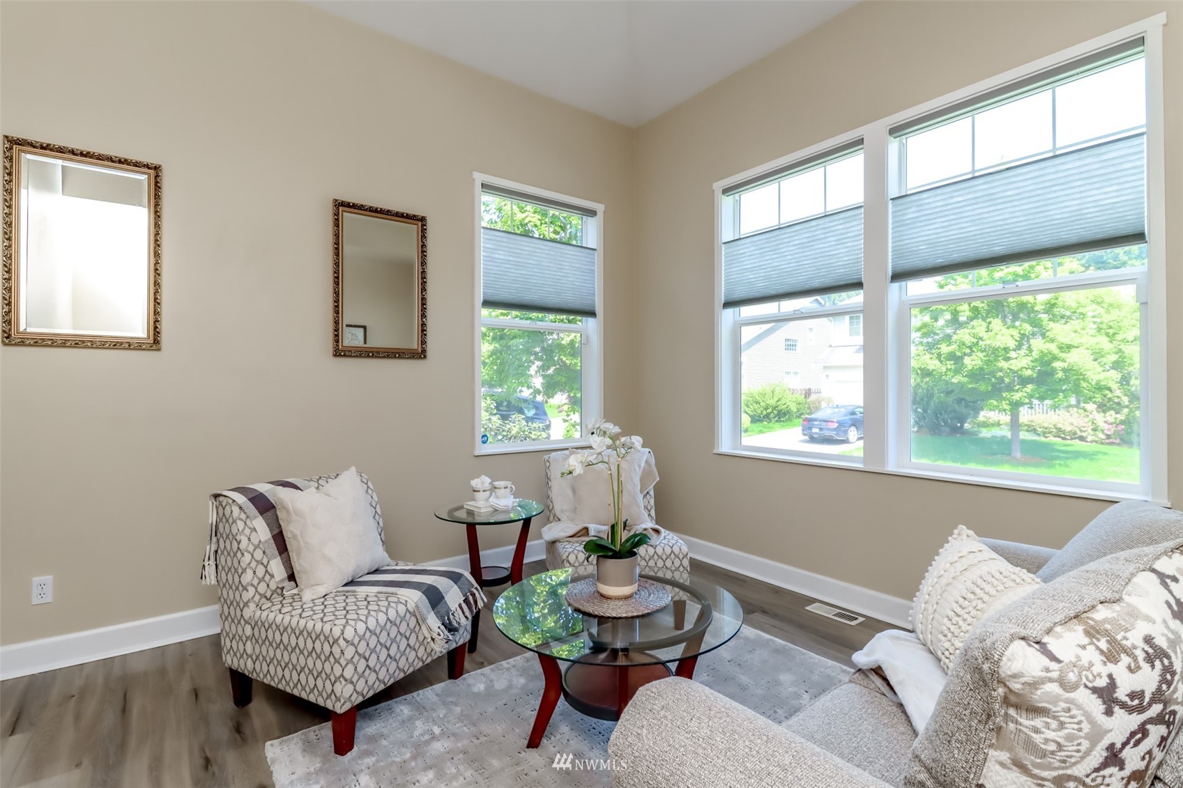 28035 Maple Ridge Way Southeast Maple Valley, WA 98038 - Photo 20 of 40 a living room with furniture and a large window