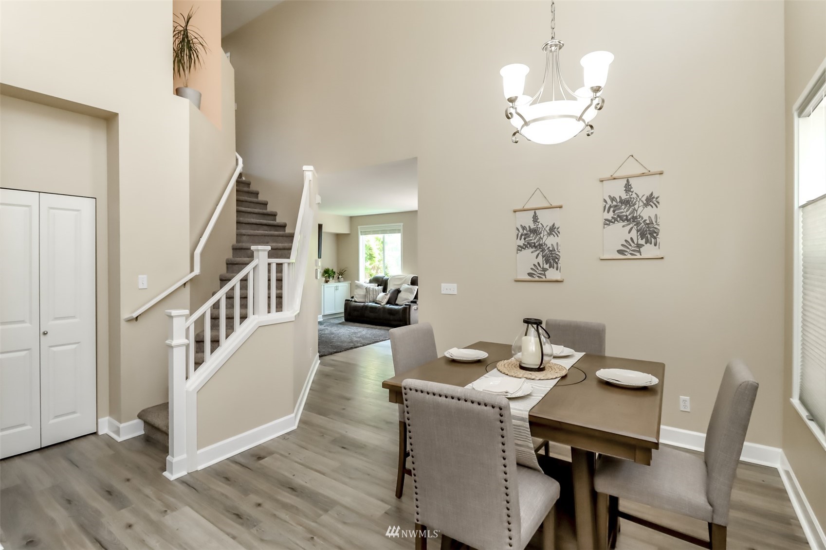 28035 Maple Ridge Way Southeast Maple Valley, WA 98038 - Photo 6 of 40 a view of a dining room with furniture and wooden floor