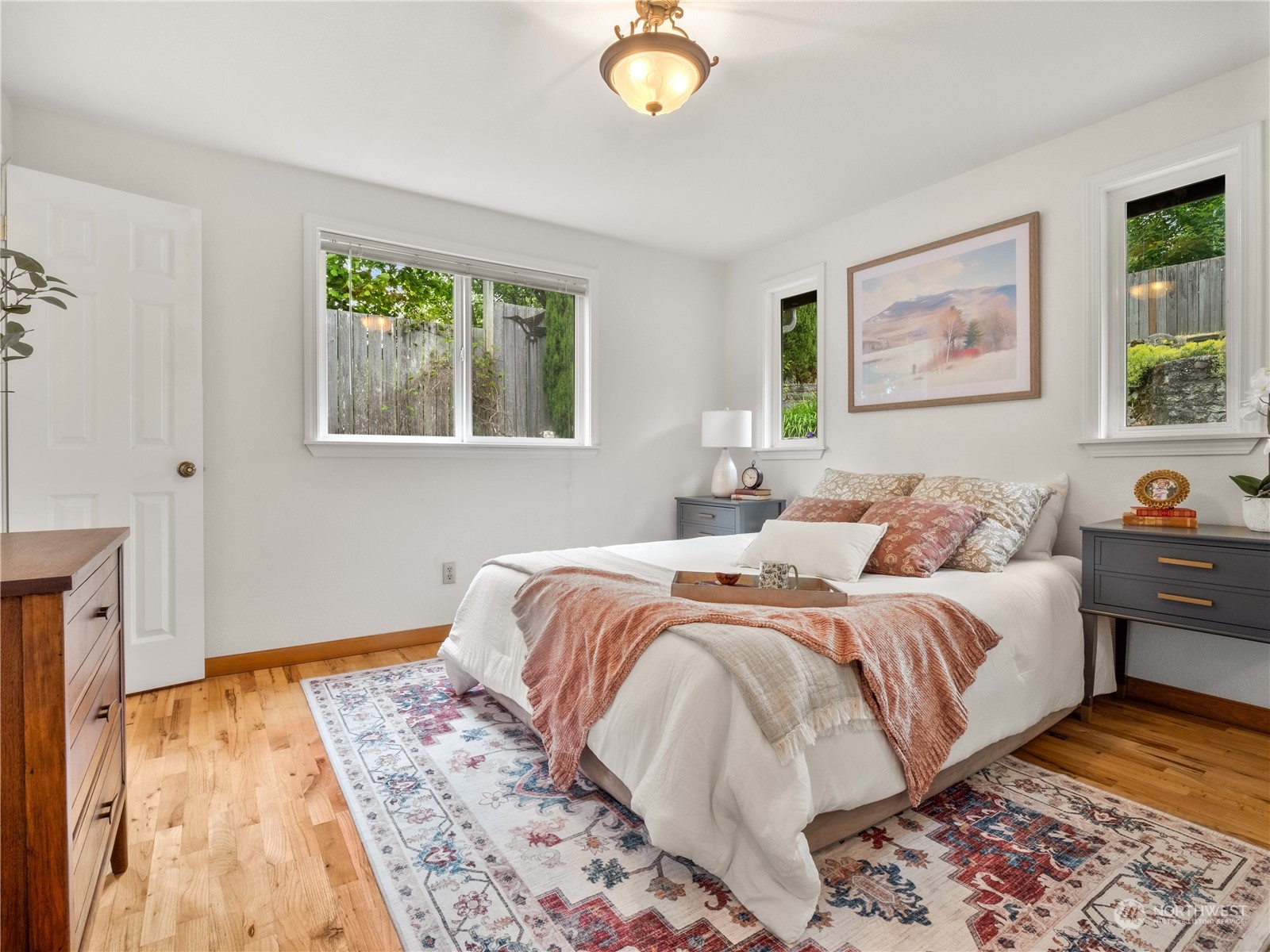 8414 14th Avenue Southwest Seattle, WA 98106 - Photo 11 of 20 a bedroom with bed and window