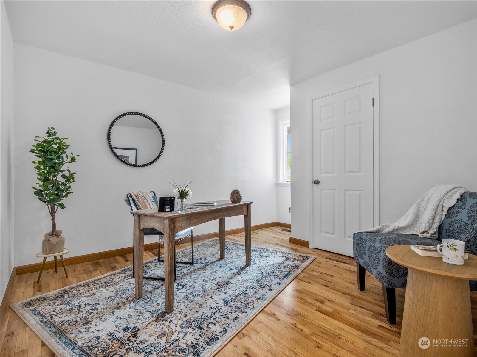 8414 14th Avenue Southwest Seattle, WA 98106 - Photo 15 of 20 a view of a workspace with furniture