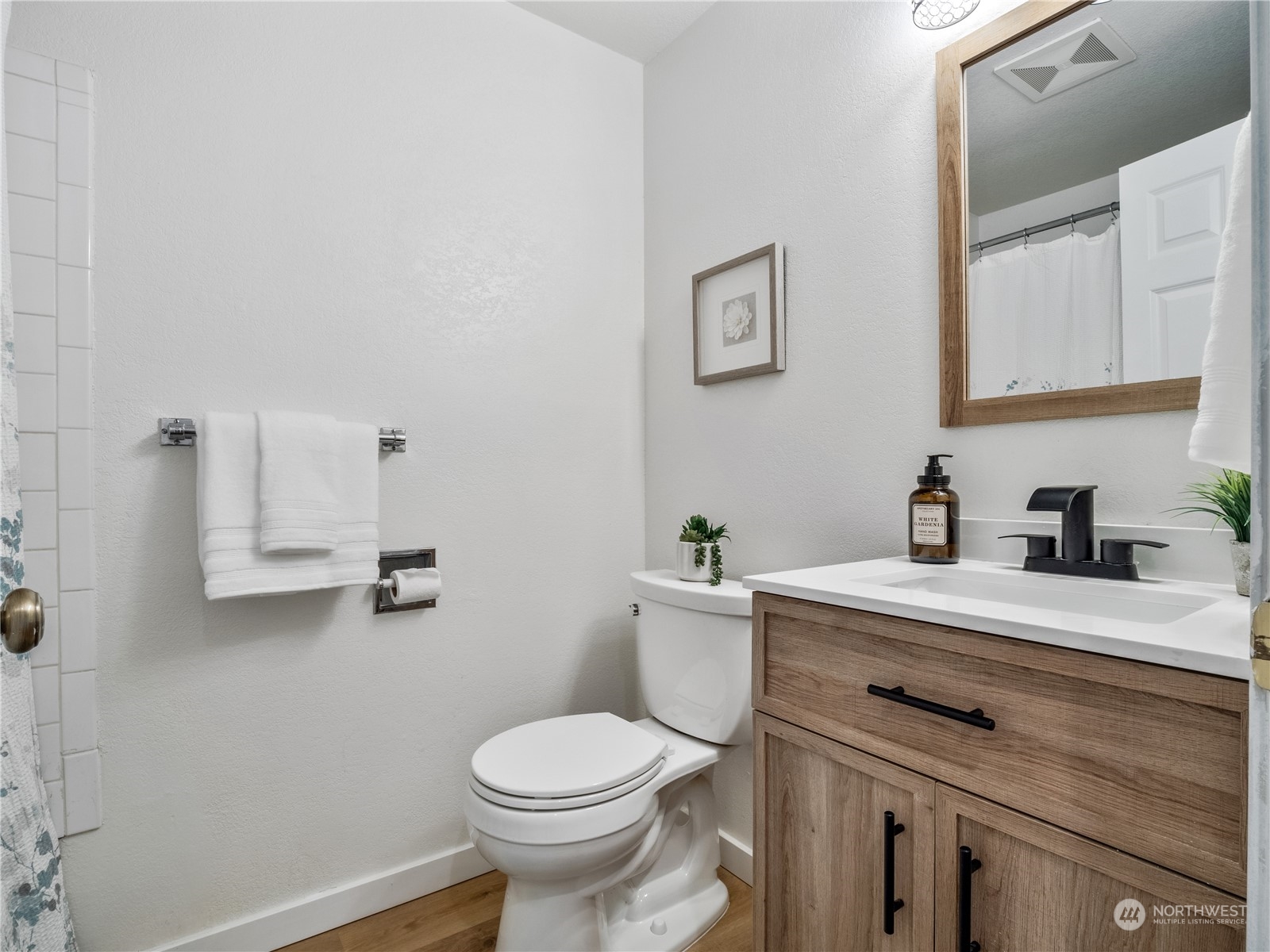 8414 14th Avenue Southwest Seattle, WA 98106 - Photo 16 of 20 a view of bathroom with a sink toilet and vanity
