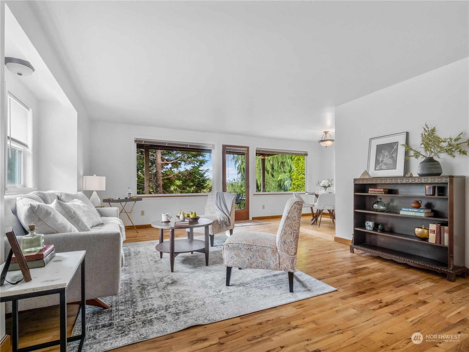8414 14th Avenue Southwest Seattle, WA 98106 - Photo 7 of 20 a living room with furniture and a wooden floor