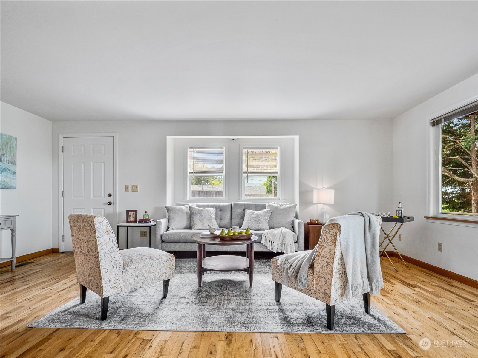 8414 14th Avenue Southwest Seattle, WA 98106 - Photo 8 of 20 a living room with furniture and a table