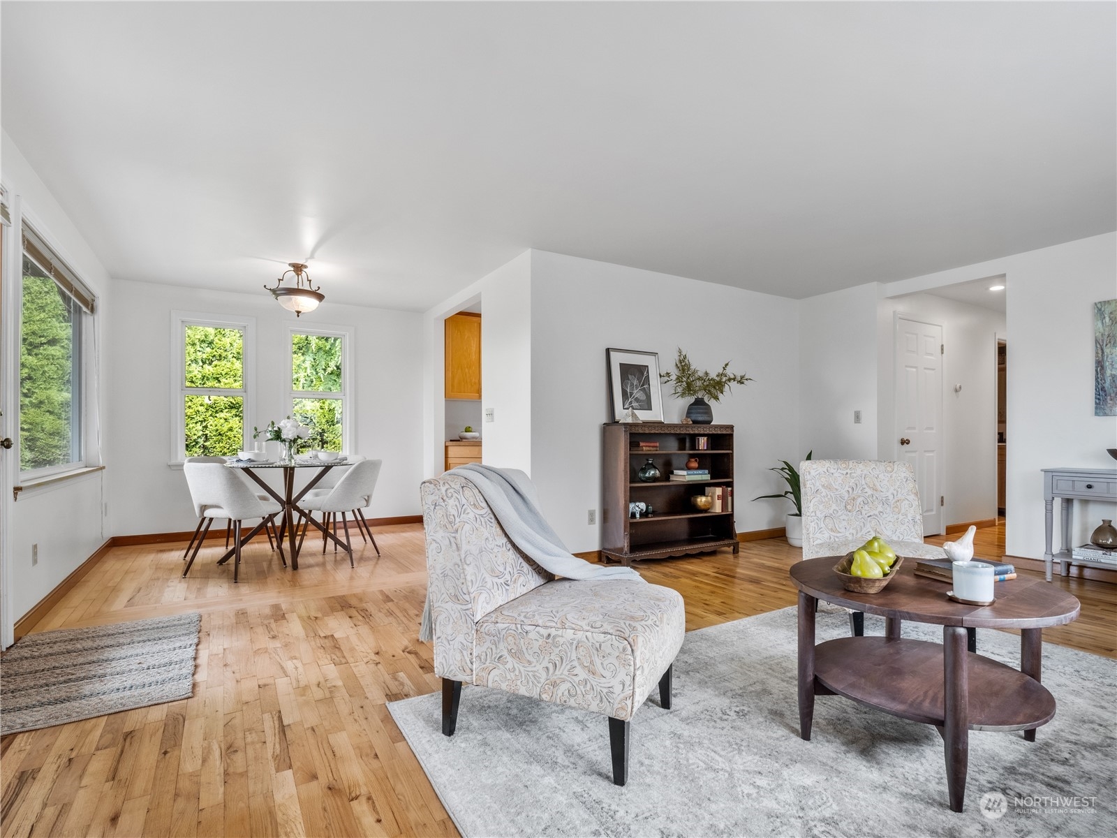 8414 14th Avenue Southwest Seattle, WA 98106 - Photo 9 of 20 a living room with furniture and a wooden floor