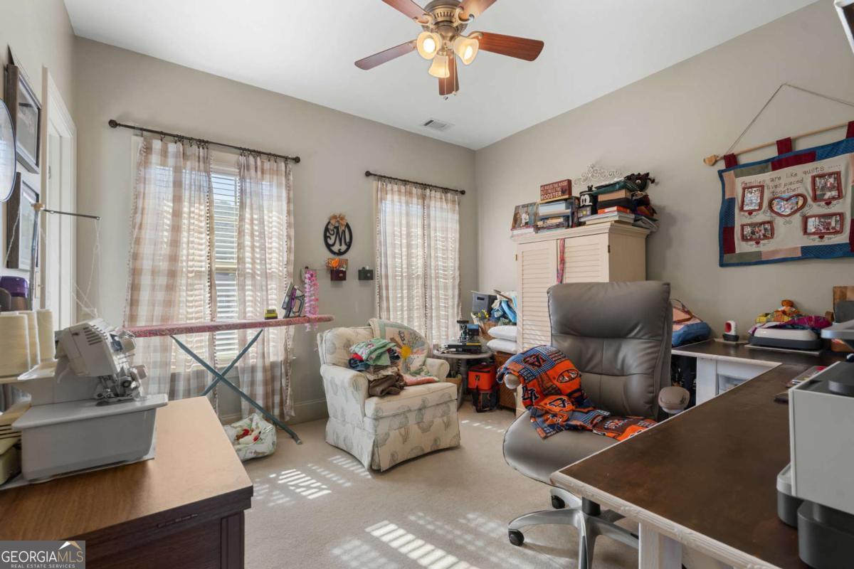 201 Walthour Drive Rincon, GA 31326 - Photo 16 of 29 a living room with furniture and a window