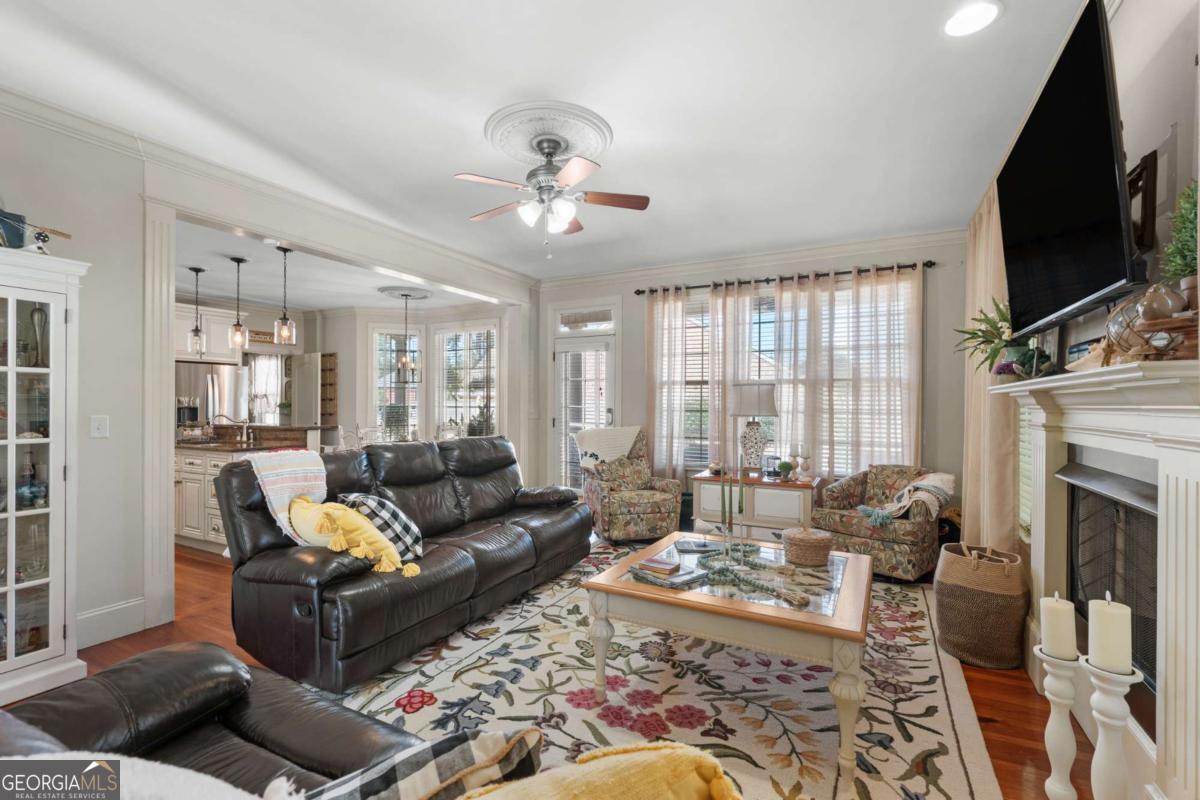 201 Walthour Drive Rincon, GA 31326 - Photo 6 of 29 a living room with furniture fireplace and flat screen tv