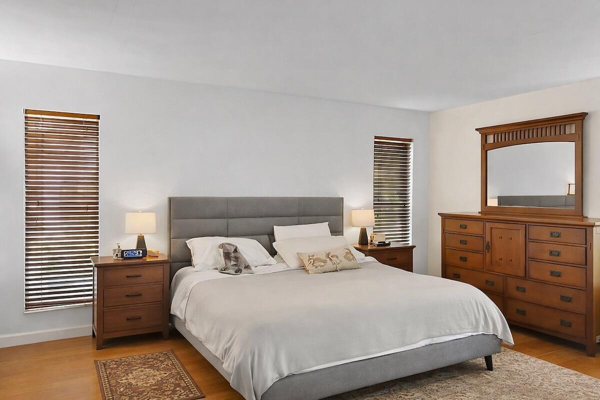 20952 Delagado Terrace Boca Raton, FL 33433 - Photo 13 of 27 a bedroom with a bed and a dresser