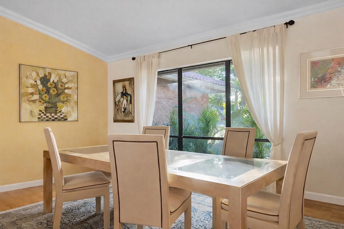 20952 Delagado Terrace Boca Raton, FL 33433 - Photo 5 of 27 a view of a dining room with furniture window and outside view