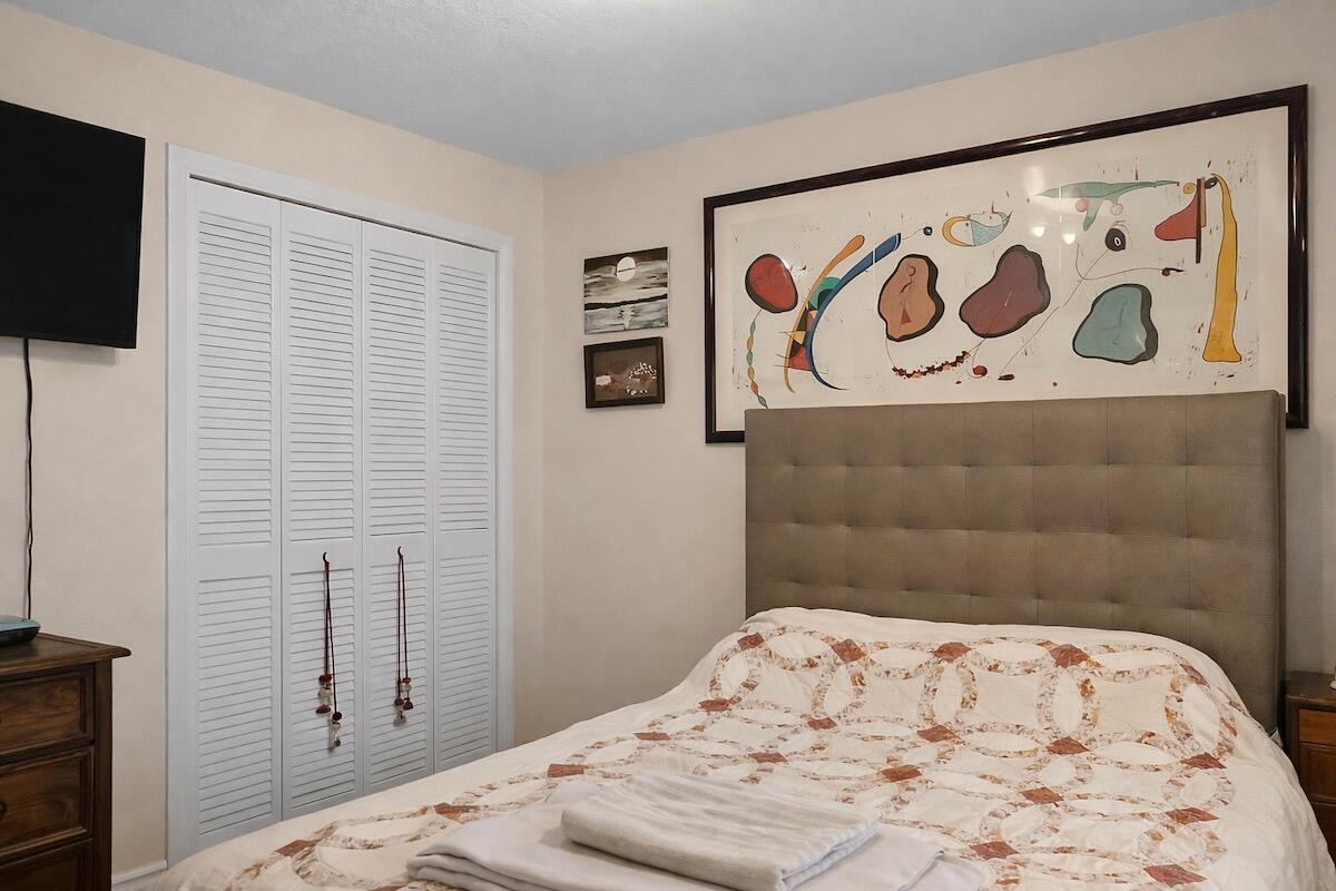 20952 Delagado Terrace Boca Raton, FL 33433 - Photo 10 of 27 a bedroom with a bed and a window