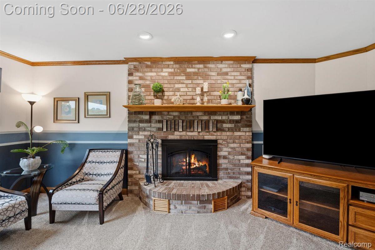 125 Olde Franklin Road Howell, MI 48855 - Photo 18 of 57 Family room w/ natural fireplace