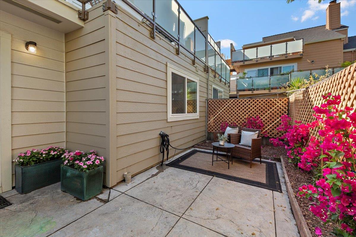 363 North Rengstorff Avenue, Unit 5 Mountain View, CA 94043 - Photo 11 of 35 a view of a patio with chairs and potted plants