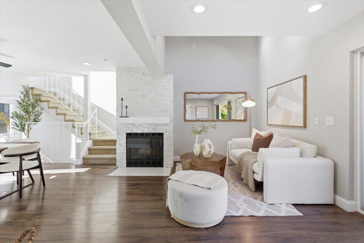 363 North Rengstorff Avenue, Unit 5 Mountain View, CA 94043 - Photo 15 of 35 a living room with furniture and a fireplace
