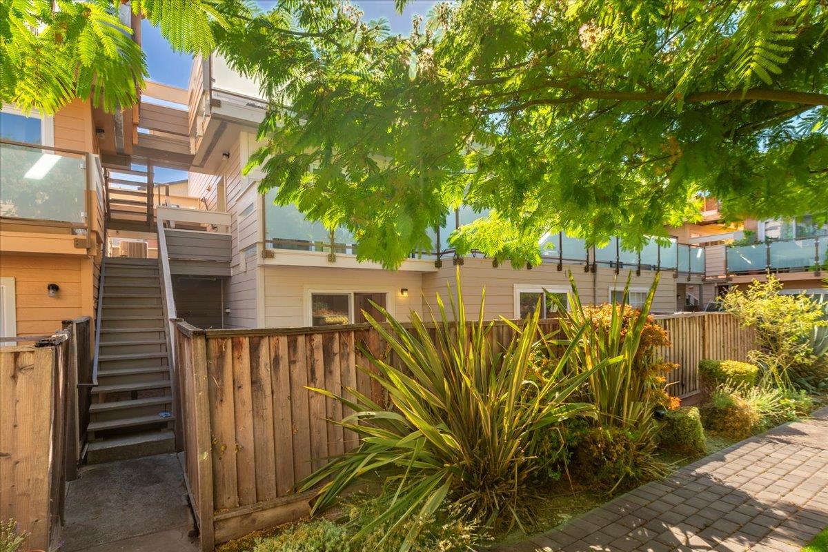 363 North Rengstorff Avenue, Unit 5 Mountain View, CA 94043 - Photo 32 of 35 a view of a street with wooden fence
