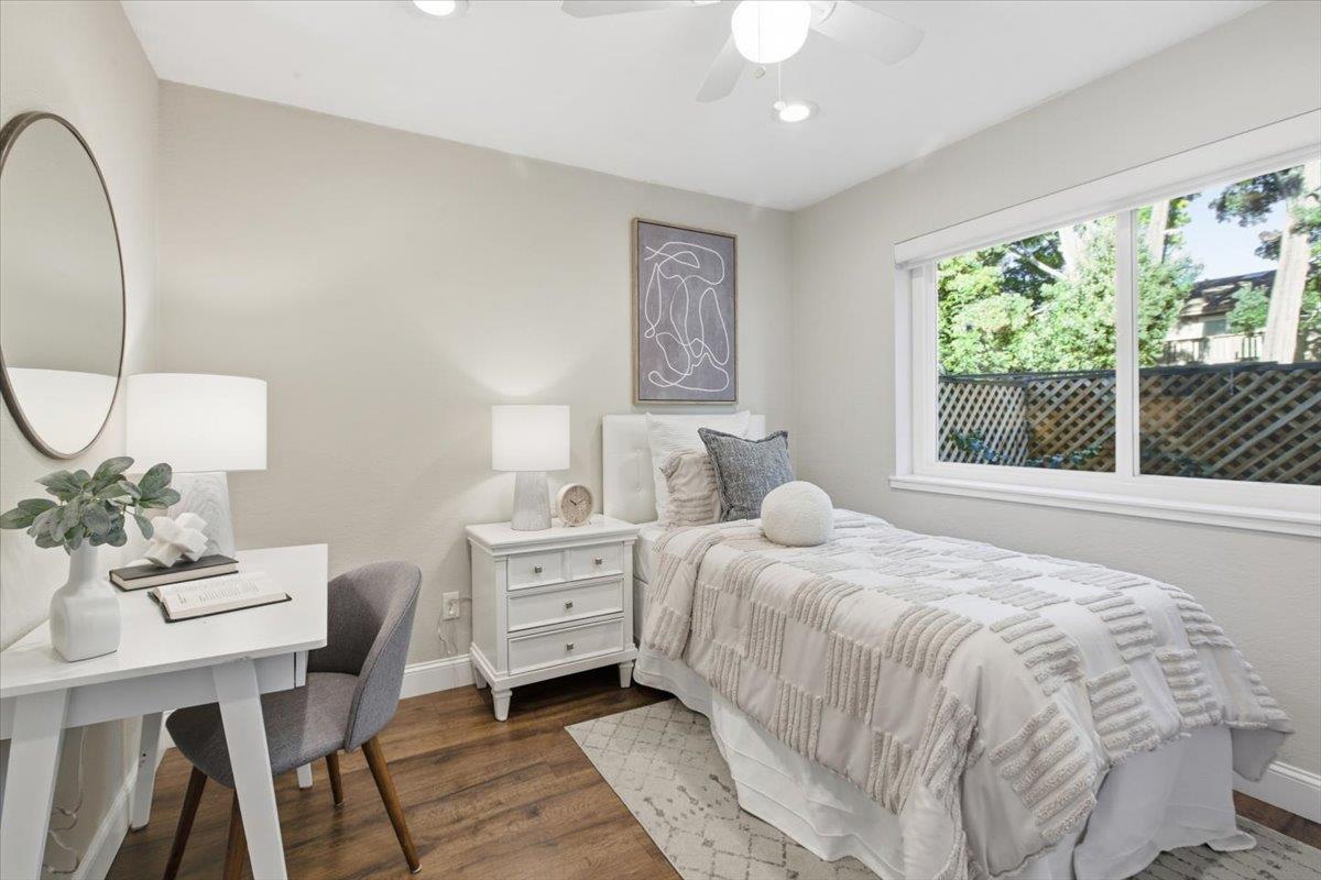 363 North Rengstorff Avenue, Unit 5 Mountain View, CA 94043 - Photo 4 of 35 a bedroom with bed and window