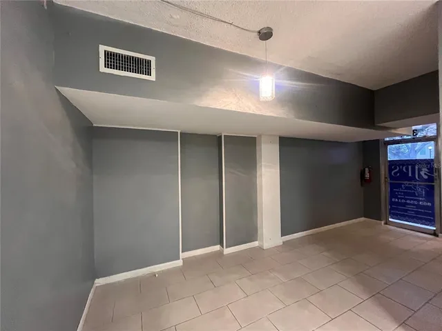 a view of an empty room with window