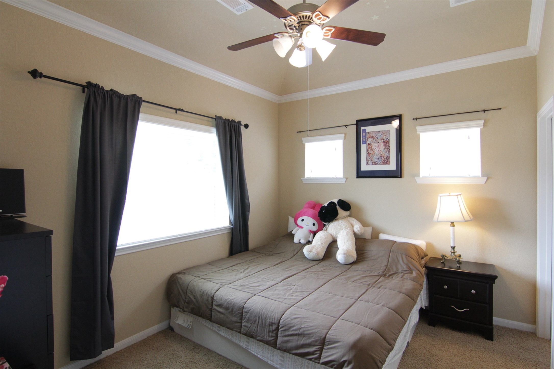 1423 Ralston Branch Way Sugar Land, TX 77479 - Photo 28 of 43 3rd bedroom with ceiling fan, carpet, crown molding, walk-in closet