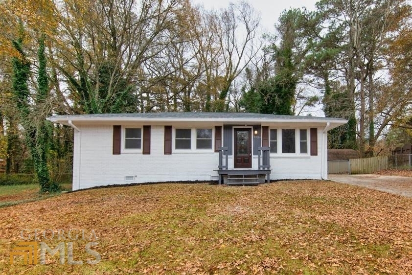 3584 Adkins Road Northwest Atlanta, GA 30331 - Photo 1 of 1 a house that has tree in front of it