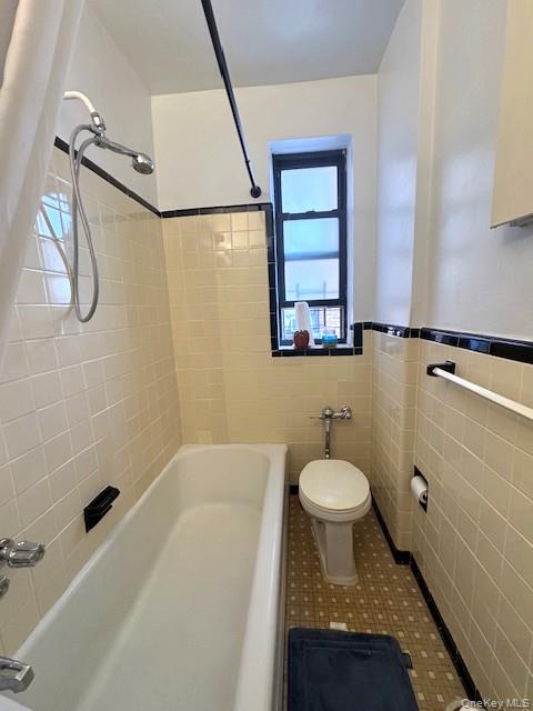 3600 Fieldston Road, Unit 4K Bronx, NY 10463 - Photo 8 of 10 a bathroom with a granite countertop sink toilet and shower