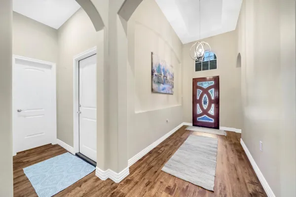 an entryway with a workspace