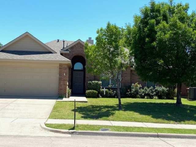 3501 Paint Drive Denton, TX 76210 - Photo 1 of 1 a front view of a house with a yard