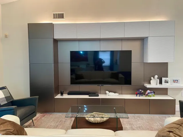 a living room with a couch and a flat screen tv