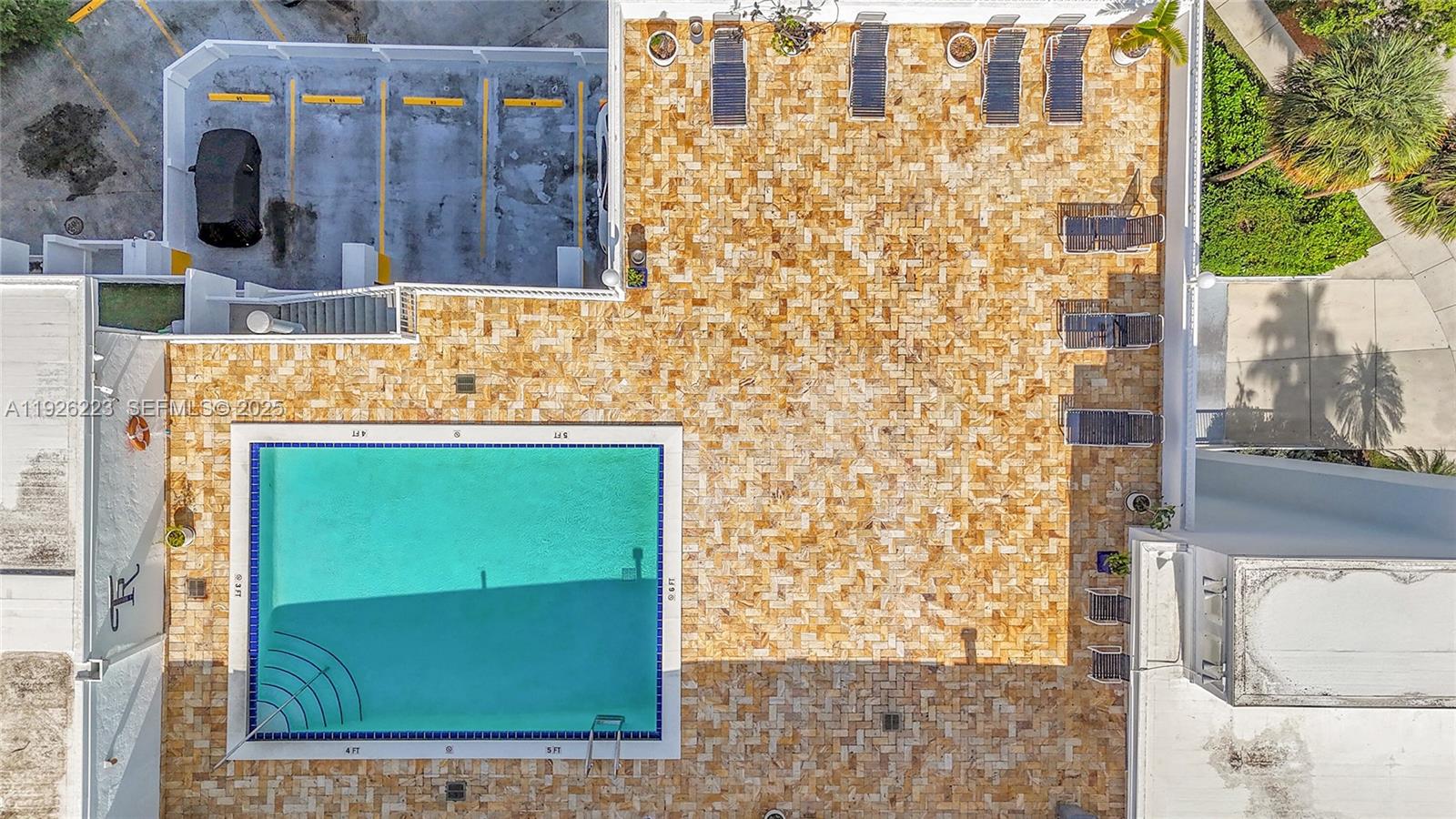 17800 Atlantic Boulevard, Unit 409 Sunny Isles Beach, FL 33160 - Photo 18 of 20 a bathroom with a sink and a mirror