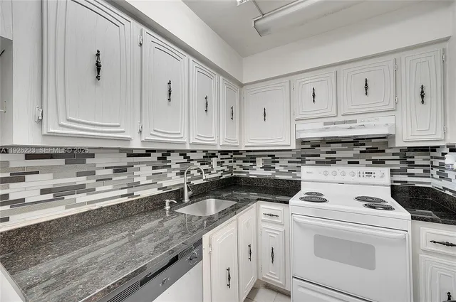 a view of a kitchen with stove