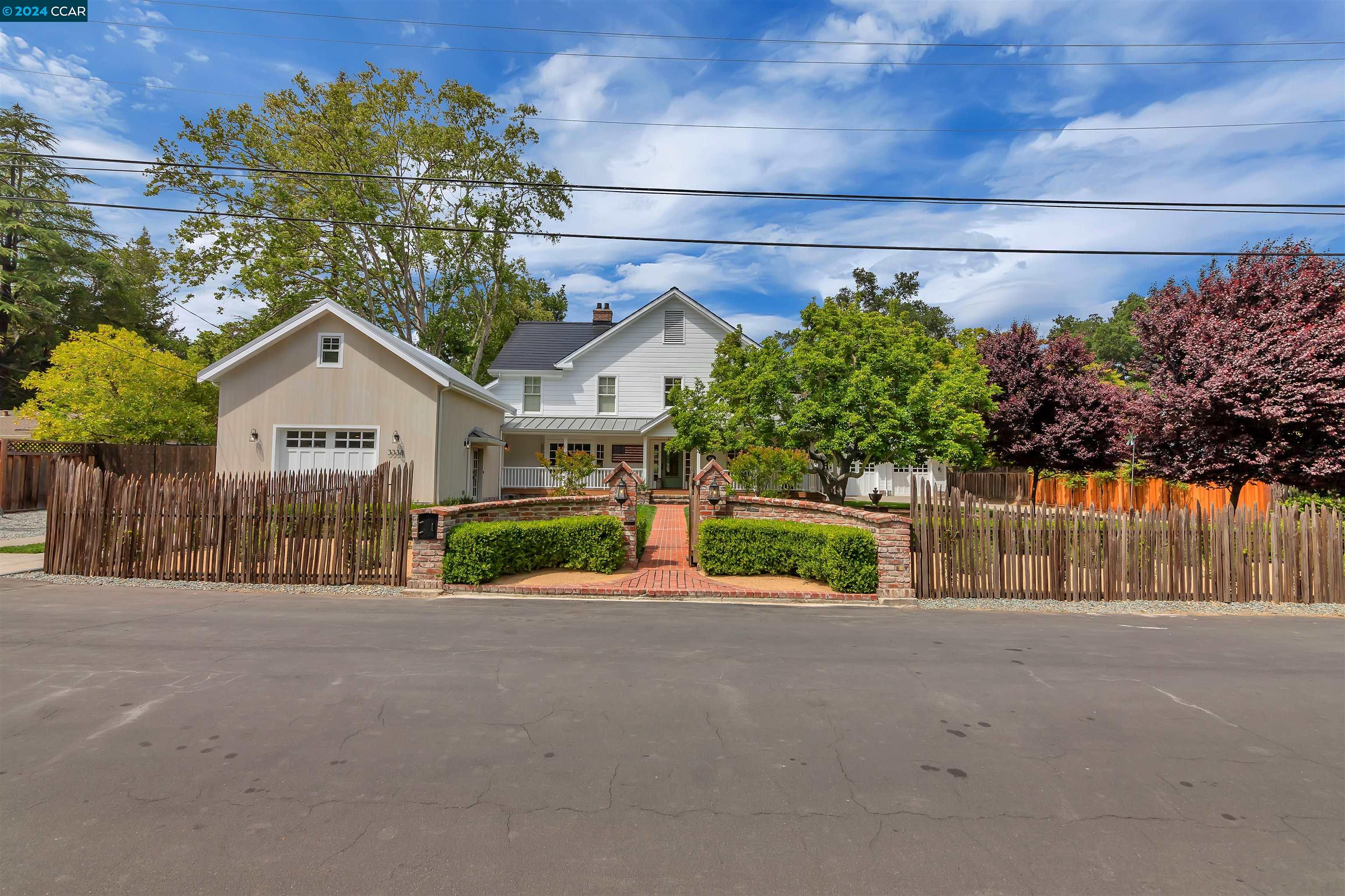 a view of house with a street