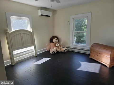 a bathroom with a vanity and a window