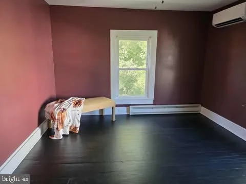 a room with chair and window