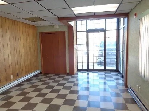 a view of a room with windows