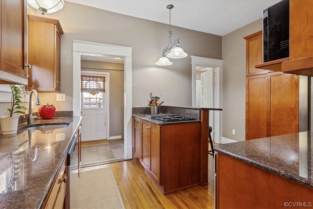 708 Hamilton Avenue Colonial Heights, VA 23834 - Photo 12 of 32 a kitchen with stainless steel appliances granite countertop a sink and a refrigerator